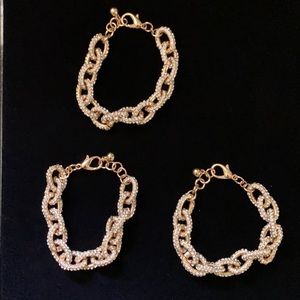 Gold and clear stone link bracelet set